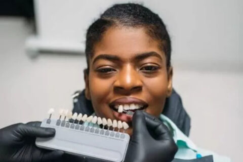 girl at the dentist getting a check up on her teeth